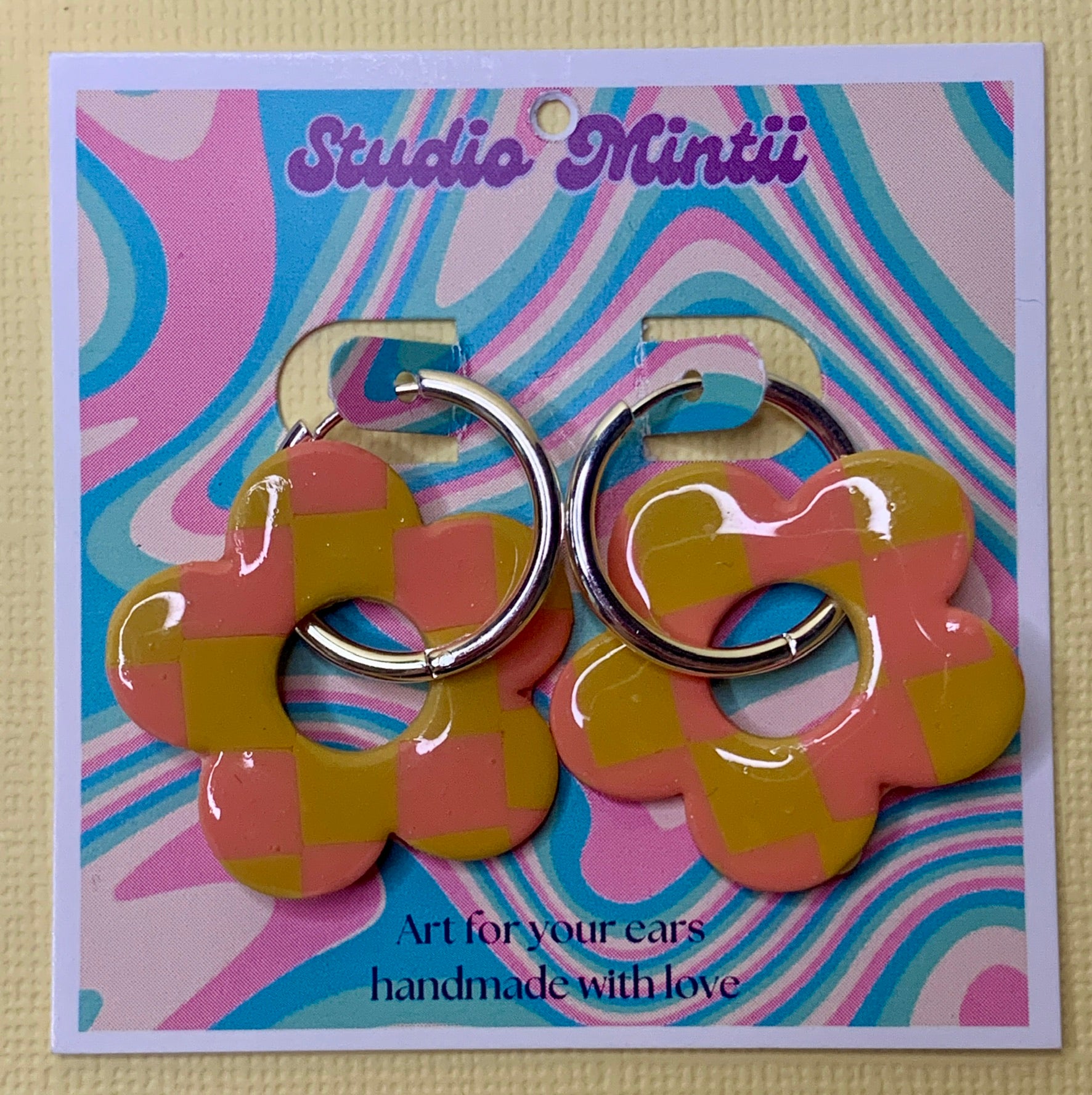 Yellow and Peach Checkered Flower Hoops - Studio Mintii Elevate your Spring look with our playful Yellow and Peach Checkered Flower Hoops. These statement earrings are the perfect pop of colour and pattern to amp up any outfit. (No more boring accessories for you!)  #