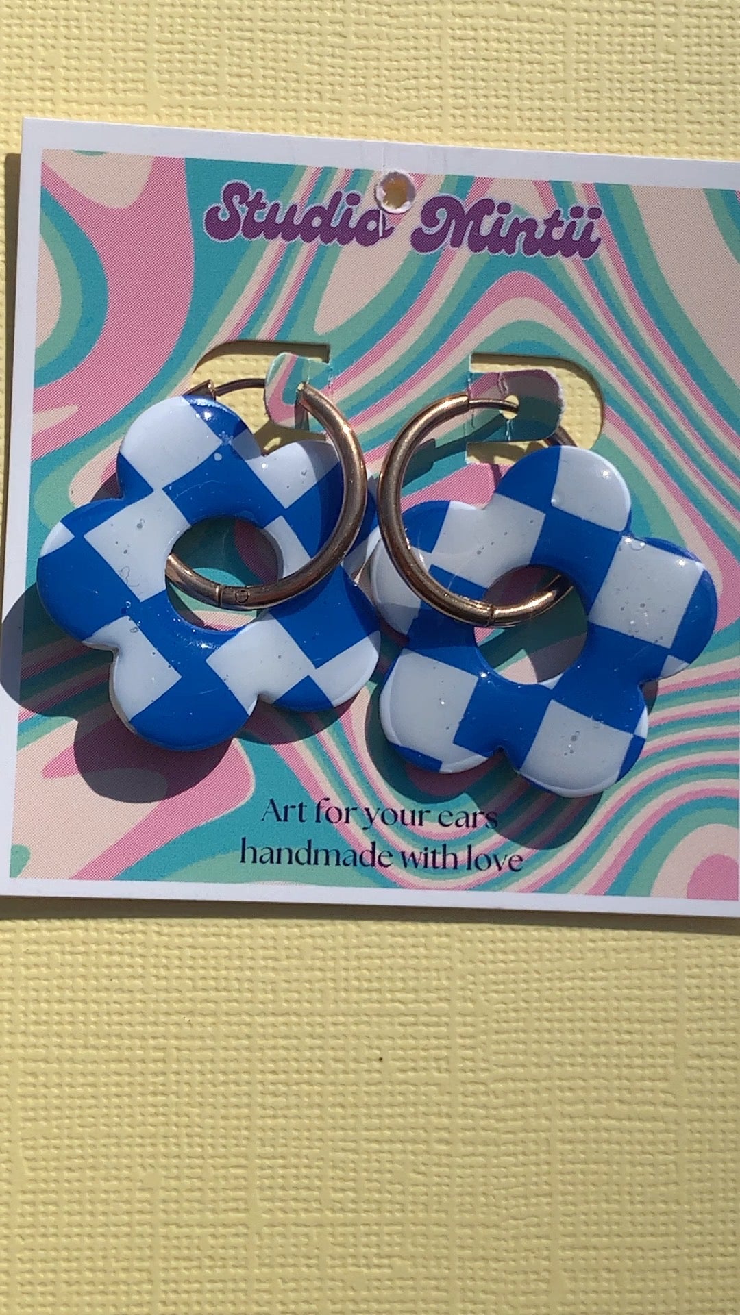 White and Blue Checkerboard Flower Hoops - Studio Mintii Add a touch of fun to your wardrobe with our White and Blue Checkerboard Flower Hoops! These playful polymer clay hoops feature a charming checkerboard pattern in white and blue, perfect for adding a pop of colour to any outfit. Stay stylish and lighthearted with these unique statement earrings!  #