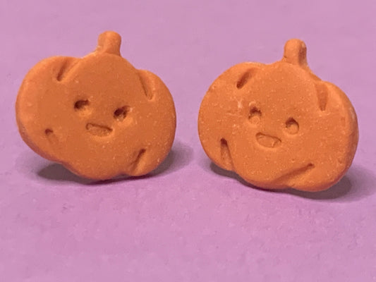 Happy Lil Pumpkin Studs - Studio Mintii Get ready to add some colour to your Halloween wardrobe with our Happy Lil Pumpkin Studs! These playful earrings will bring a smile to your face with their fun and quirky design. Perfect for pumpkin spice lovers and Halloween enthusiasts alike. (Limited stock, so hurry before they're gone!)  #